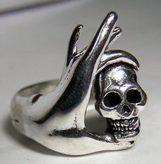 HAND WITH FINGERS HOLDING SKULL HEAD BIKER RING (Sold by the piece) *