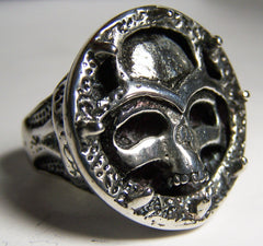 SKULL HEAD IN CIRCLE OF SPIKES DELUXE BIKER RING  (Sold by the piece) * CLOSEOUT $ 3.75 EA